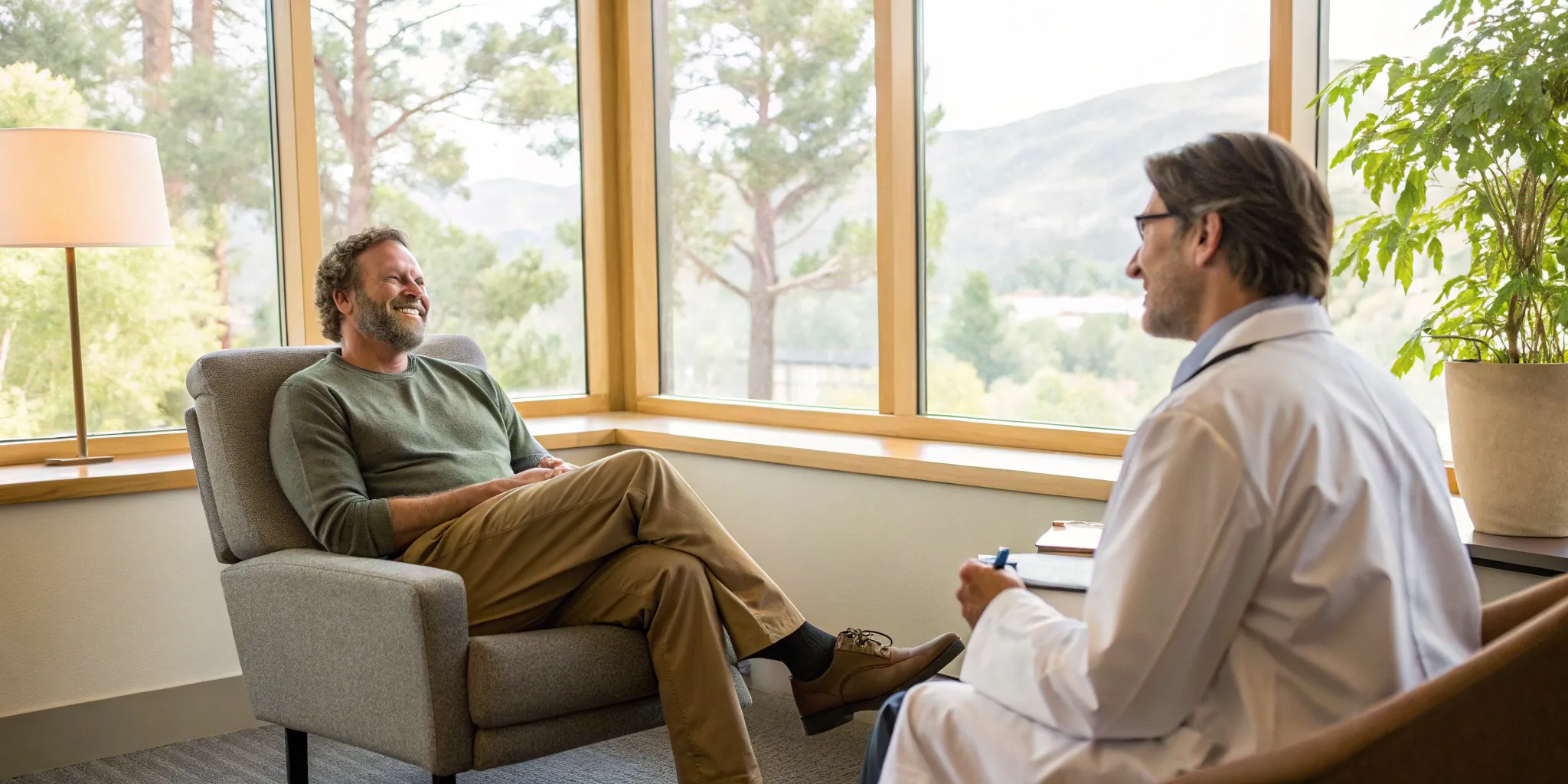 trt-explained-your-guide-to-testosterone-therapy Man talking with a doctor during a TRT consultation.