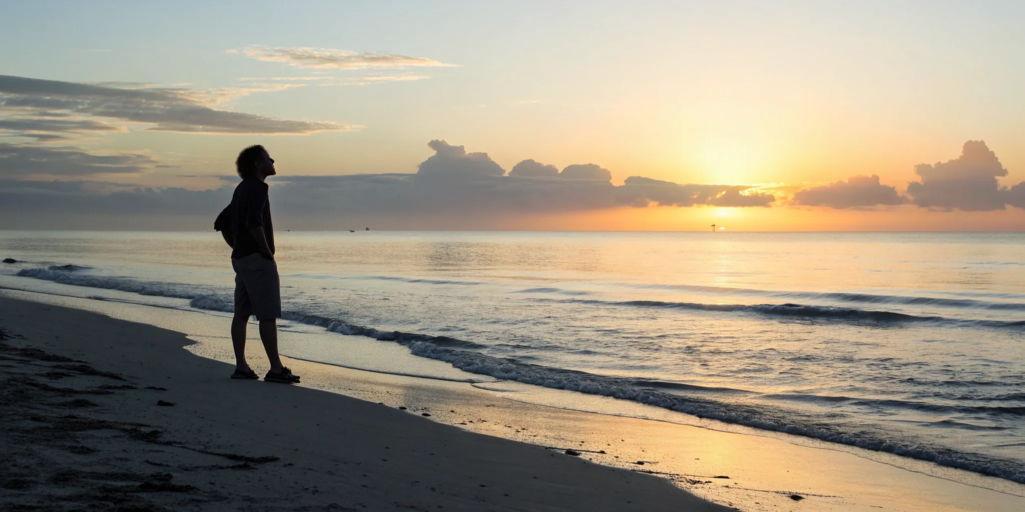 how-to-find-the-right-miami-weight-loss-doctor-386790 Man watching the sunrise on a Miami beach, ready to find the right weight loss doctor.